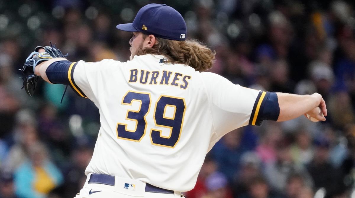 Milwaukee Brewers starting pitcher Corbin Burnes throws during the first inning of a baseball game against the Atlanta Braves Wednesday, May 18, 2022, in Milwaukee.