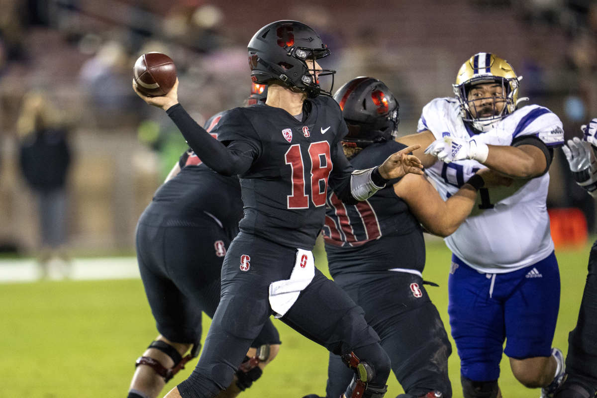 Stanford Cardinal quarterback Tanner McKee (18) passes the football during the third quarter against the Washington Huskies at Stanford Stadium.