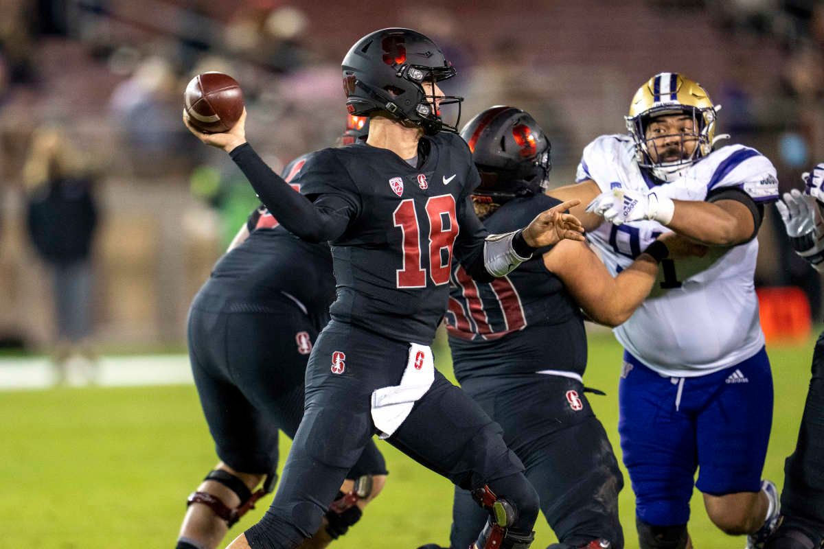 Stanford Cardinal quarterback Tanner McKee (18) passes the football during the third quarter against the Washington Huskies at Stanford Stadium.