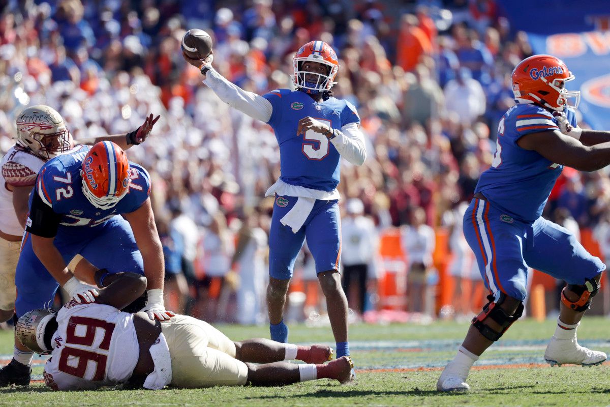 Florida Gators quarterback Emory Jones (5) throws the ball against the Florida State Seminoles during the second quarter at Ben Hill Griffin Stadium.