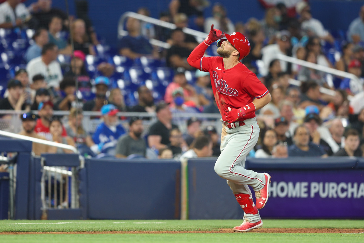Bryce Harper celebrates after crushing a home run against the Miami Marlins.
