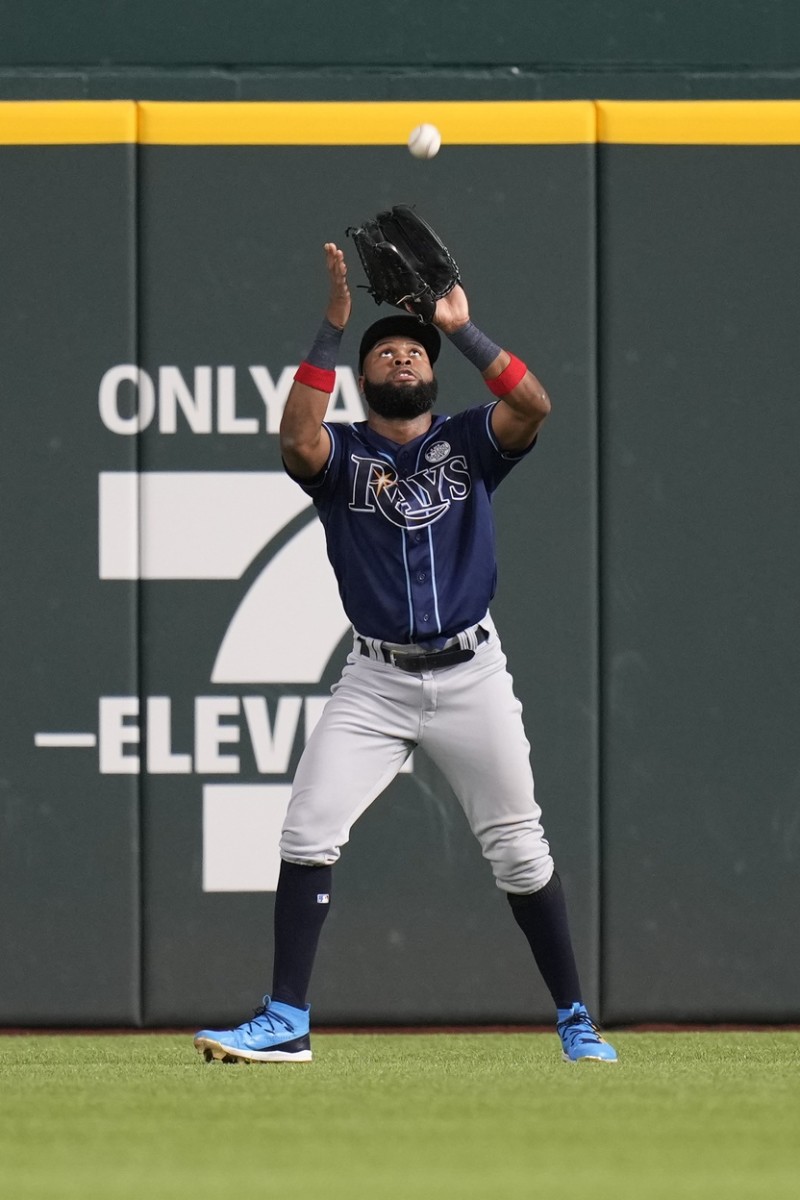 Tampa Bay Rays right fielder Manuel Margot (13) catches the fly-out hit by Texas Rangers left fielder Zach Reks (not pictured) during the second inning at Globe Life Field. ()Jim Cowsert-USA TODAY Sports)