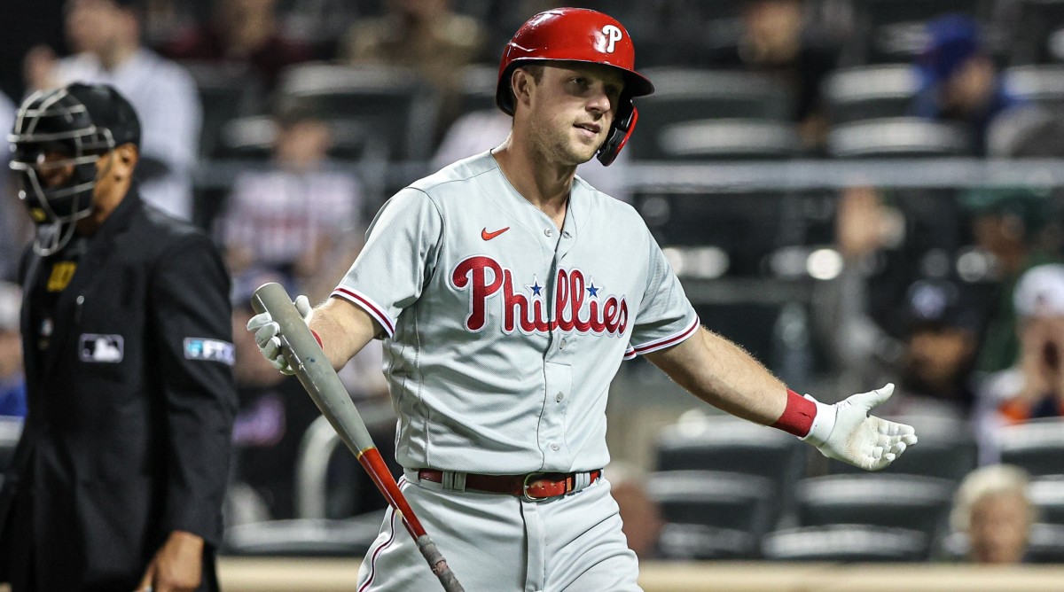 Phillies first baseman Rhys Hoskins reacts after striking out
