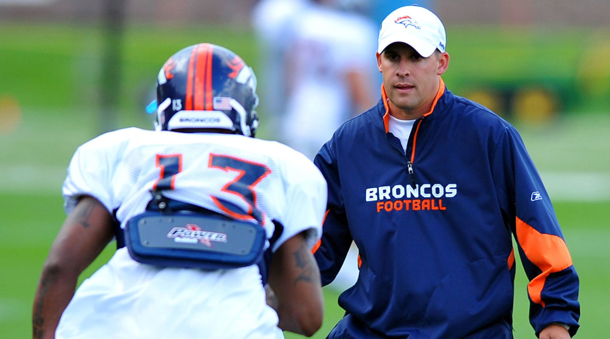 Josh McDaniels coaching the Broncos at practice in June 2009