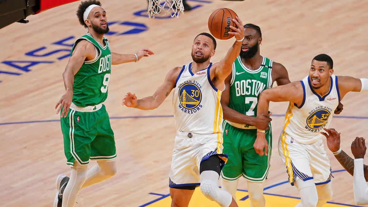 Golden State Warriors guard Stephen Curry (30) shoots the ball against the Boston Celtics during the second half of Game 1 of the 2022 NBA Finals.