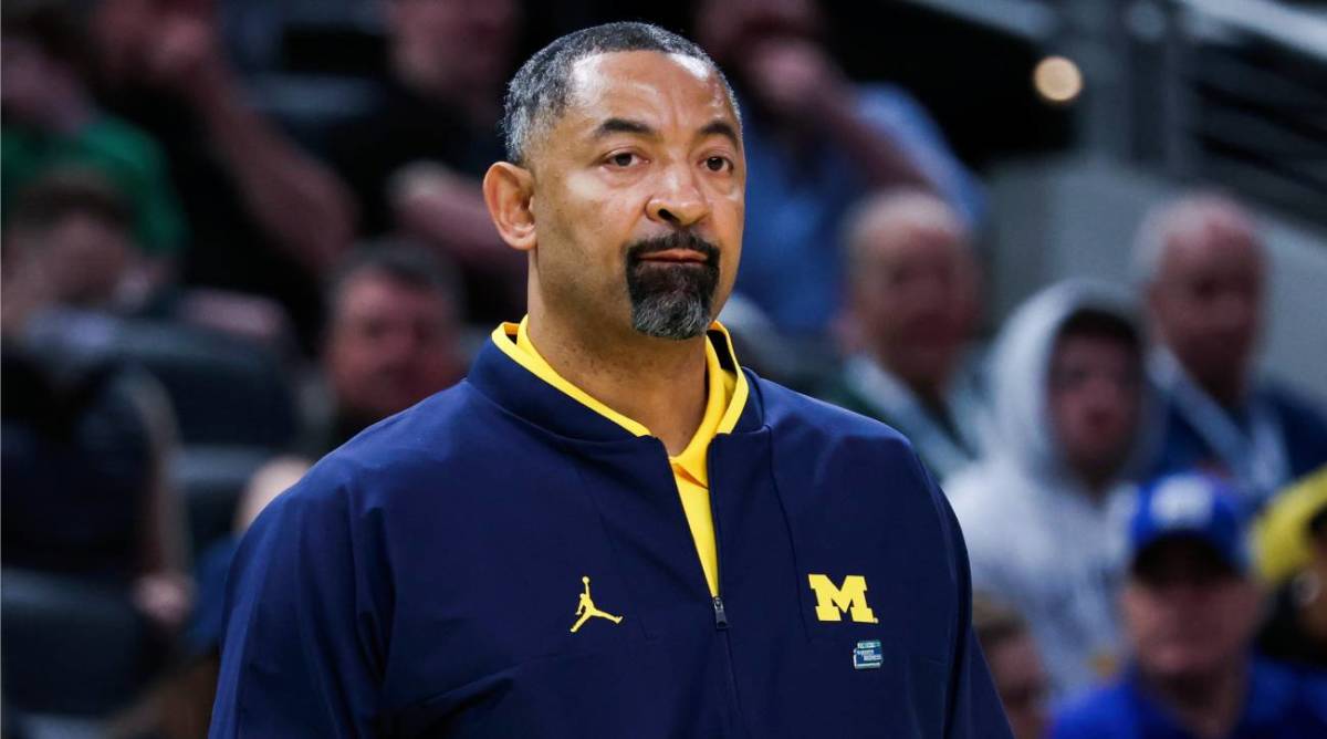 Mar 17, 2022; Indianapolis, IN, USA; Michigan Wolverines head coach Juwan Howard watches from the bench against the Colorado State Rams in the first half during the first round of the 2022 NCAA Tournament at Gainbridge Fieldhouse. Mandatory Credit: Trevor Ruszkowski-USA TODAY Sports