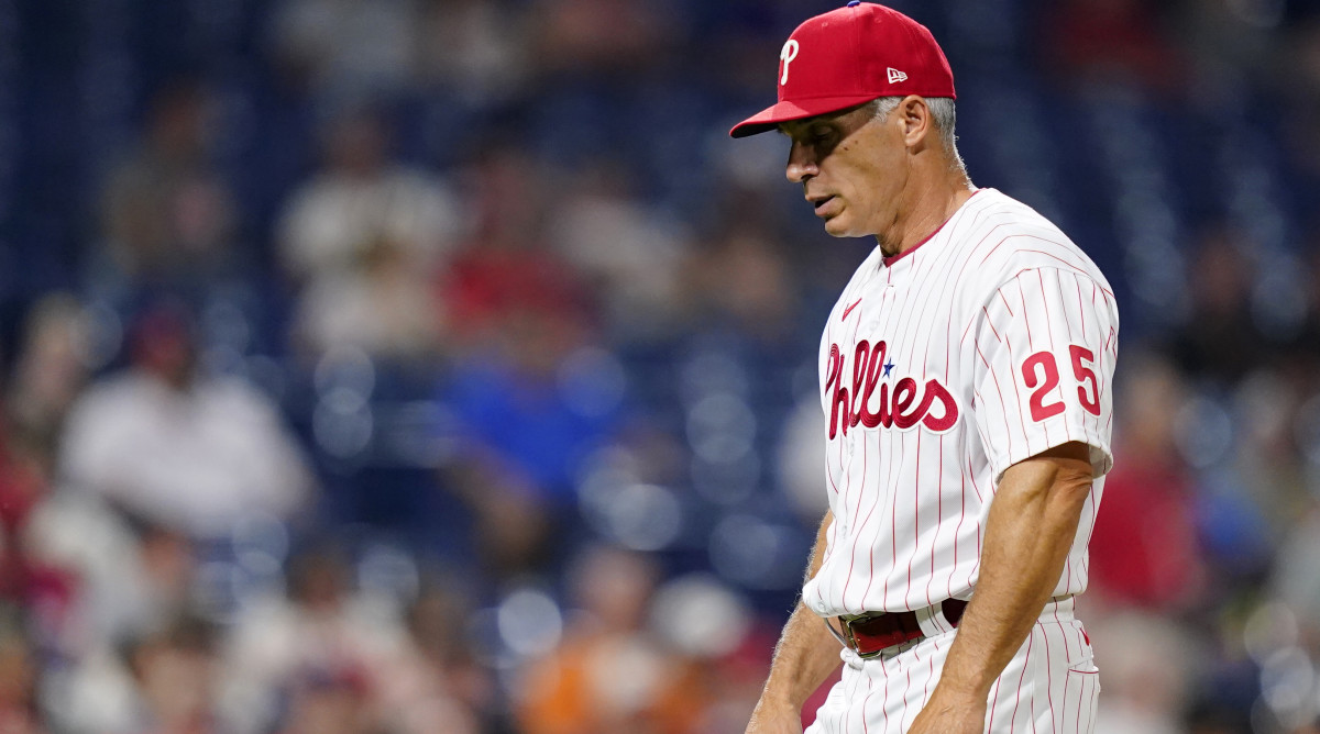 Philadelphia Phillies’ Joe Girardi walks to the dugout during a baseball game, Tuesday, May 31, 2022, in Philadelphia. Joe Girardi was fired by the Philadelphia Phillies on Friday, June 3, 2022, after his team’s terrible start, becoming the first major league manager to lose his job this season. Philadelphia said bench coach Rob Thomson will become interim manager for the rest of the season.