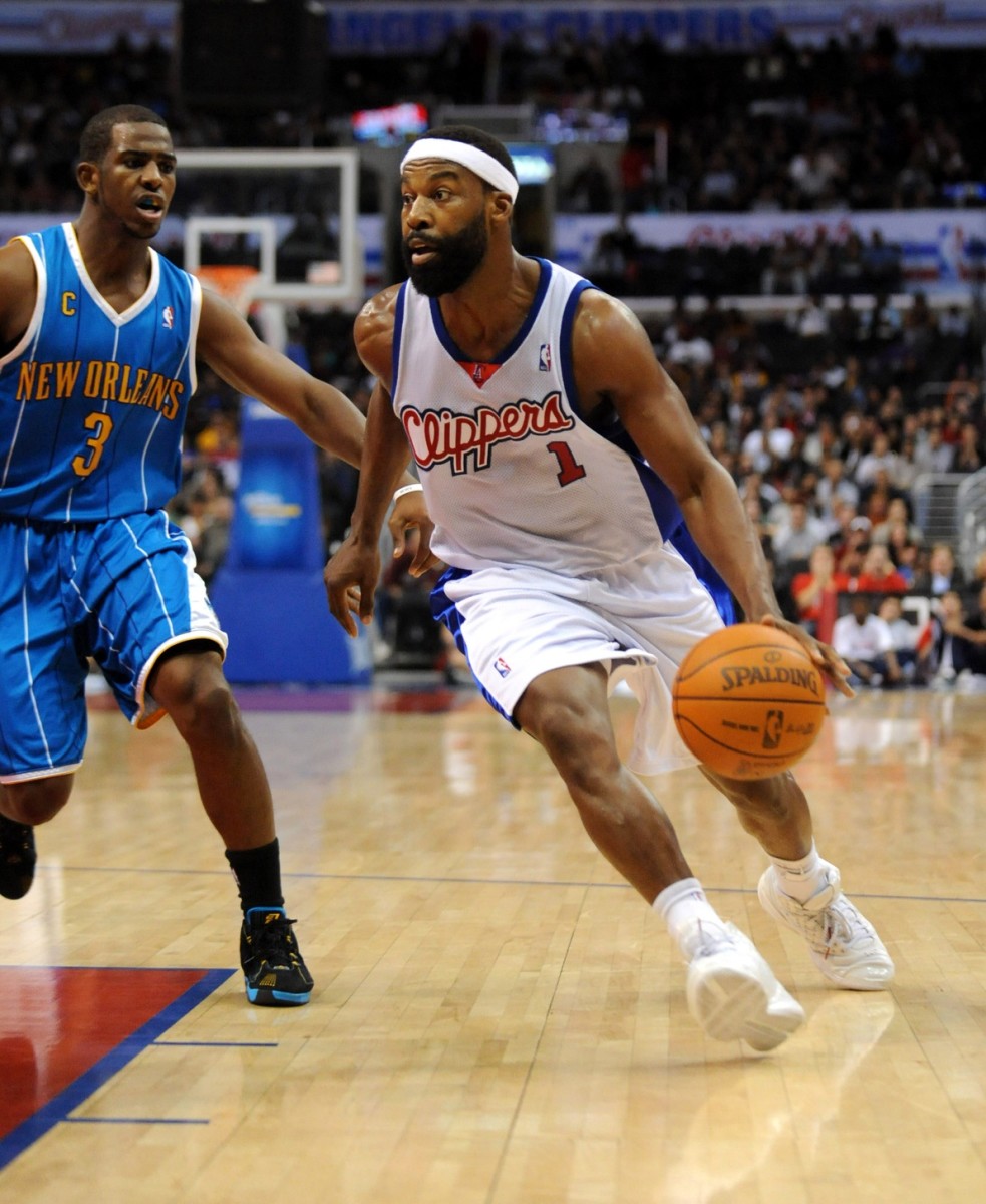 Nov 9, 2009; Los Angeles, CA, USA; Los Angeles Clippers guard Baron Davis (1) is defended by New Orleans Hornets guard Chris Paul (3) at the Staples Center. The Hornets defeated the Clippers 112-84. Mandatory Credit: Kirby Lee/Image of Sport-USA TODAY Sports