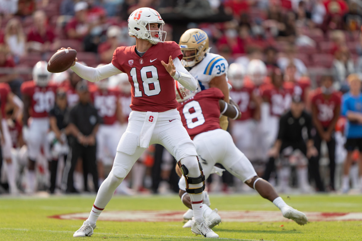Stanford Cardinal quarterback Tanner McKee (18) throws the football against the UCLA Bruins during the first quarter at Stanford Stadium.