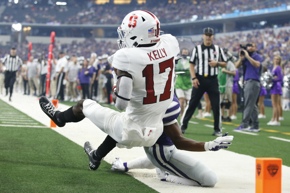 Stanford Cardinal cornerback Kyu Blu Kelly (17) makes an interception against Kansas State Wildcats wide receiver Phillip Brooks (88) in the first quarter at AT&T Stadium.
