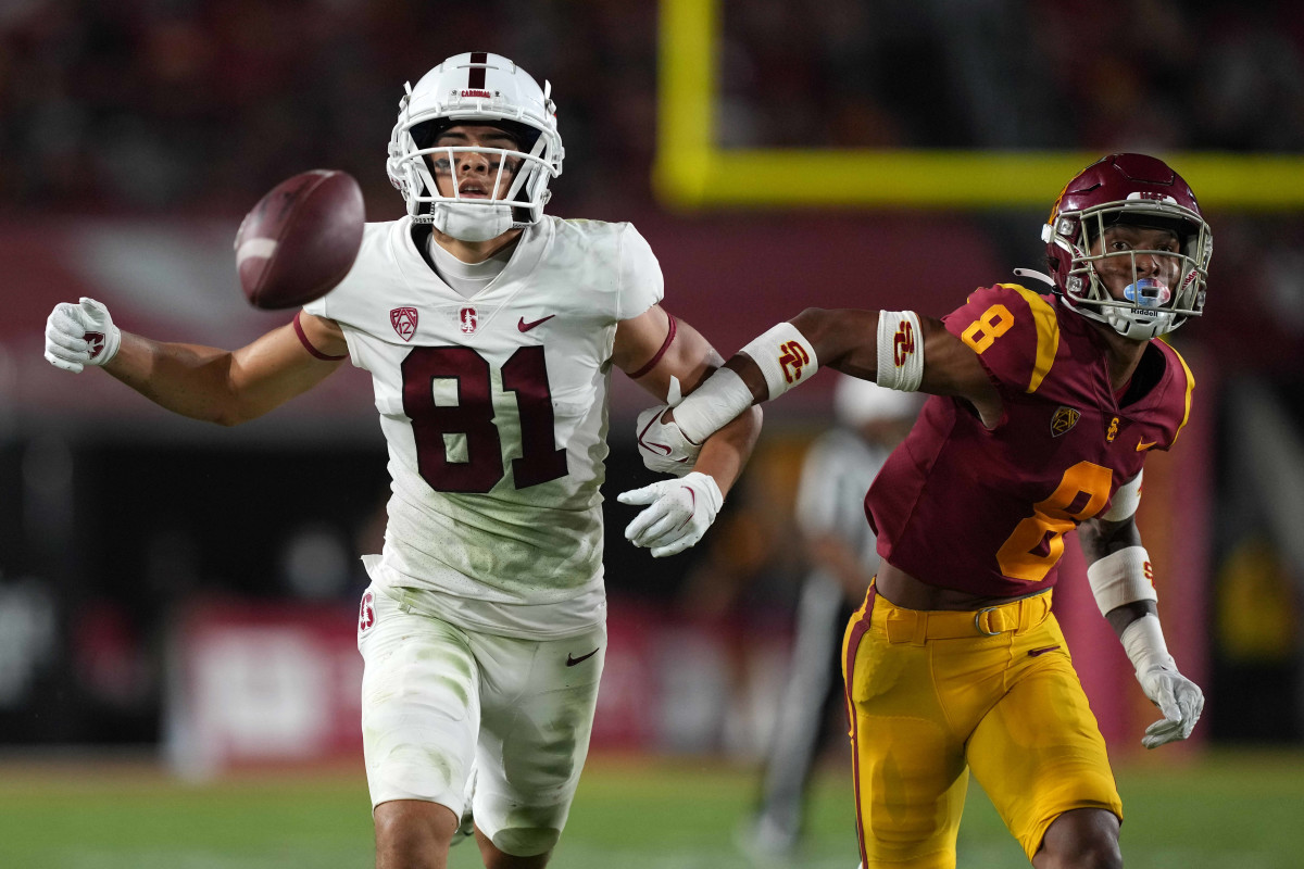 Stanford Cardinal wide receiver Brycen Tremayne (81) battles for a pass against Southern California Trojans cornerback Chris Steele (8) in the third quarter at United Airlines Field at Los Angeles Memorial Coliseum.