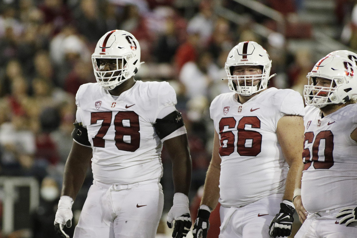 Stanford offensive tackle Myles Hinton (78), guard Branson Bragg (66) and center Drake Nugent (60) stand on the field during the second half of an NCAA college football game against Washington State.
