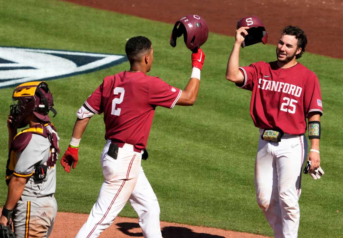 Stanford Drew Bowser (2) celebrates with Kody Huff (25) after hitting a home run against Arizona State during the Pac-12 Baseball Tournament at Scottsdale Stadium.
