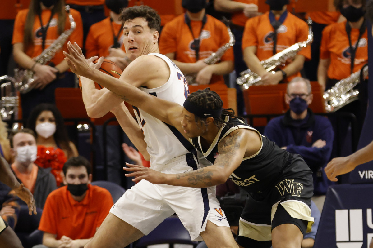 Virginia Cavaliers center Francisco Caffaro (22) steals the ball from Wake Forest Demon Deacons guard Alondes Williams (31) during the second half at John Paul Jones Arena.