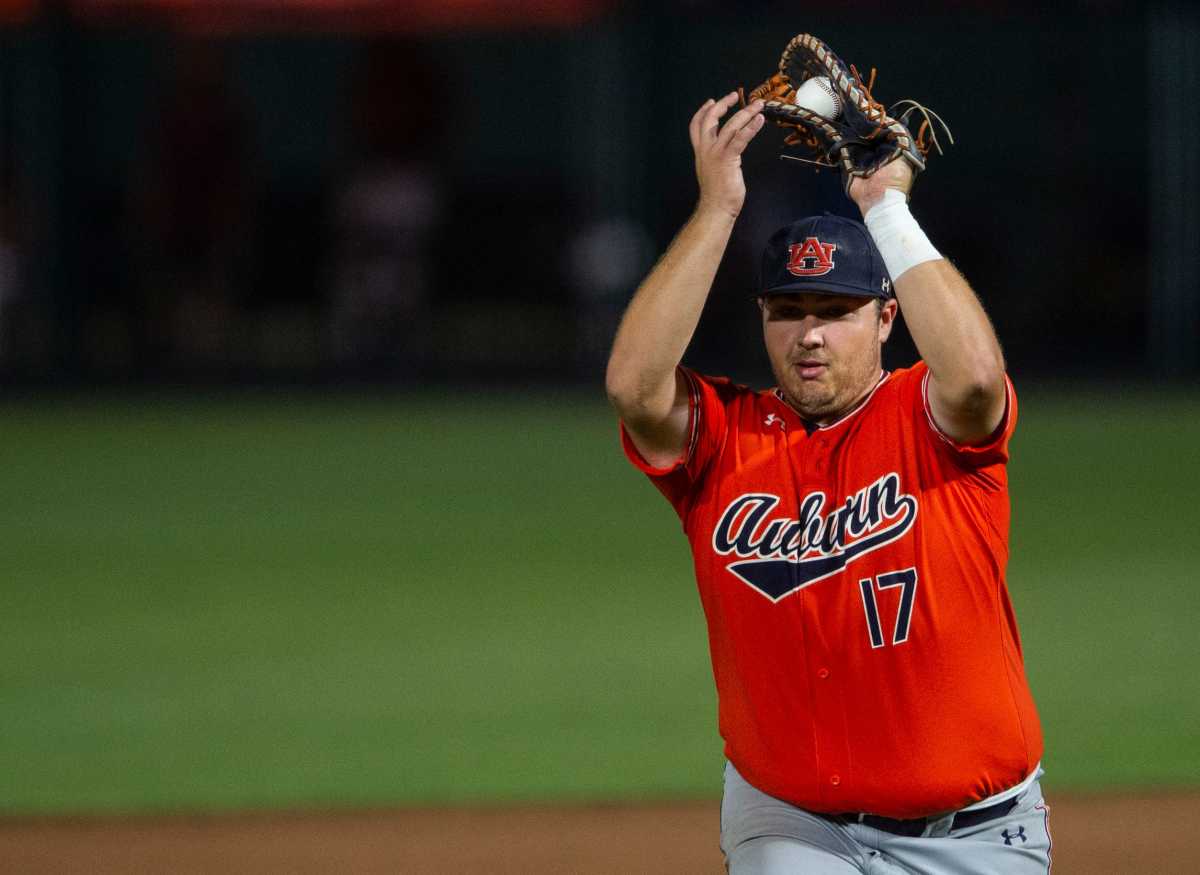 Auburn Tigers infielder Sonny DiChiara (17) catches a fly ball during the NCAA regional baseball tournament at Plainsman Park in Auburn, Ala., on Saturday, June 4, 2022. Auburn Tigers defeated Florida State Seminoles 21-7.