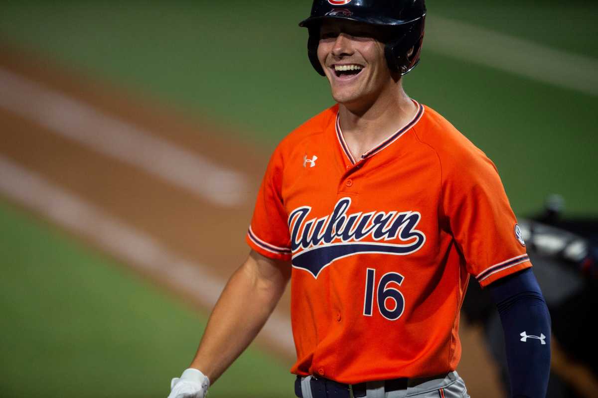 Auburn Tigers player Cam Hill (16) celebrates after hitting a home run during the NCAA regional baseball tournament at Plainsman Park in Auburn, Ala., on Saturday, June 4, 2022. Auburn Tigers defeated Florida State Seminoles 21-7.