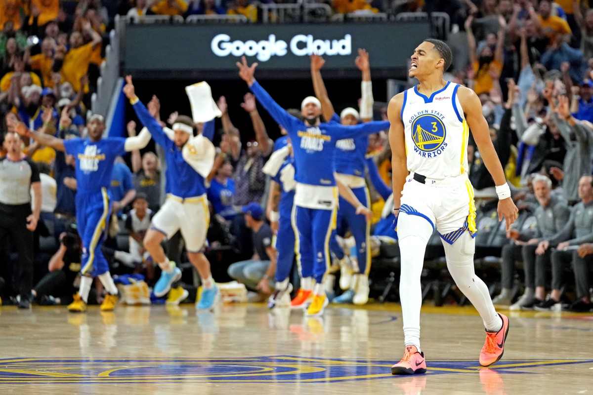 Jun 5, 2022; San Francisco, California, USA; Golden State Warriors guard Jordan Poole (3) reacts after making a last second shot at the end of the third quarter against the Boston Celtics during game two of the 2022 NBA Finals at Chase Center. Mandatory Credit: Kyle Terada-USA TODAY Sports