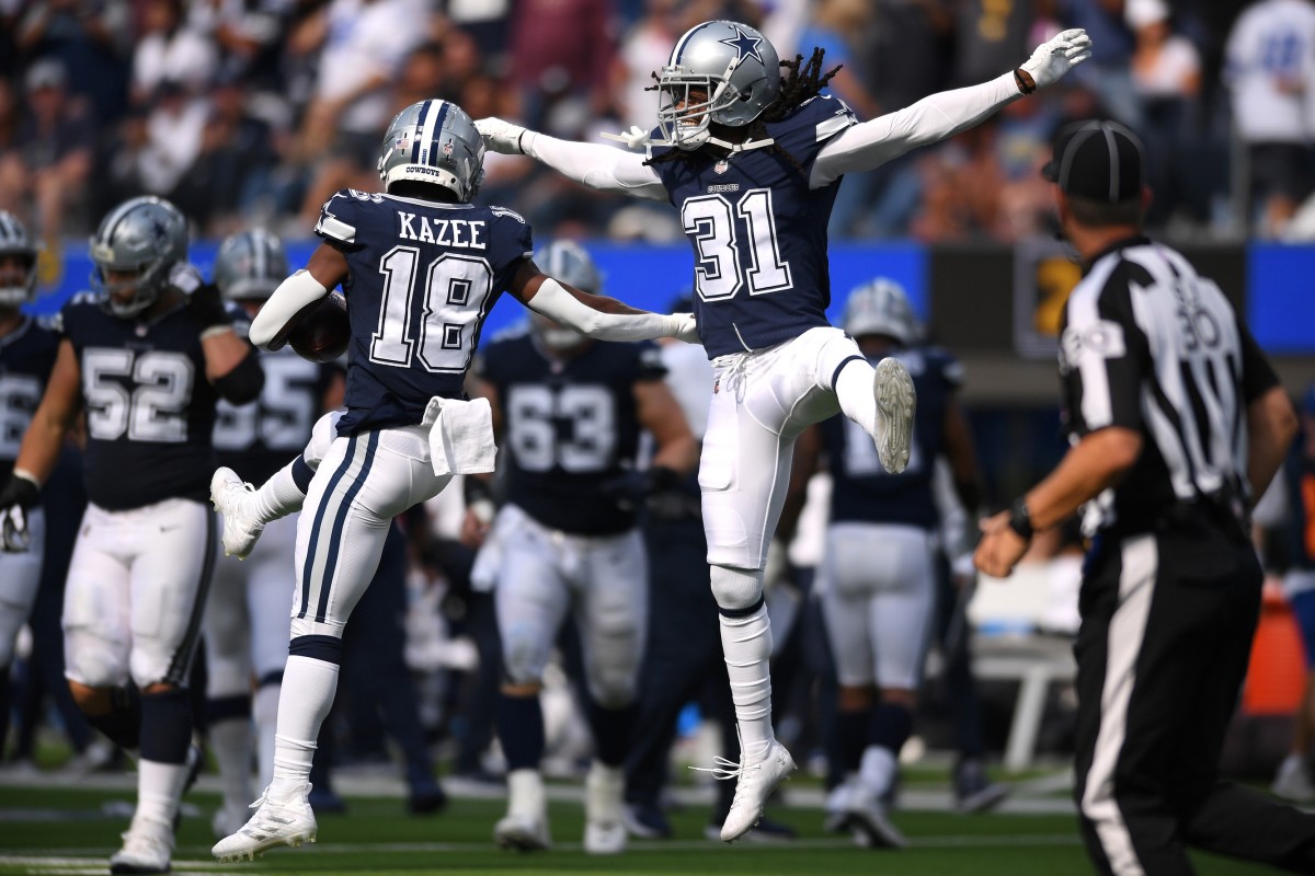 Sep 19, 2021; Inglewood, California, USA; Dallas Cowboys strong safety Damontae Kazee (18) celebrates with cornerback Maurice Canady (31) after an interception against the Los Angeles Chargers during the second half at SoFi Stadium.