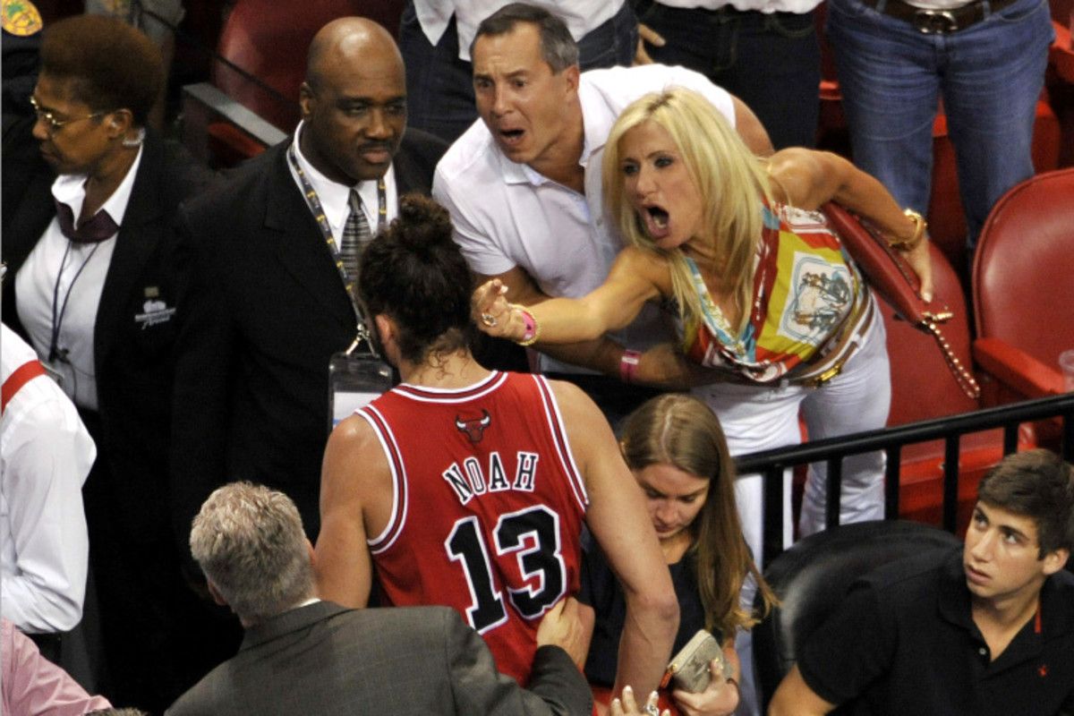 Joakim Noah greeted by a Miami fan.
