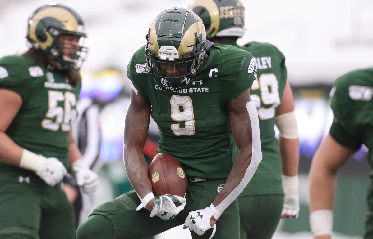 Colorado State Rams wide receiver Warren Jackson (9) celebrates his touchdown reception in the second quarter against the Boise State Broncos at Sonny Lubick Field at Canvas Stadium.