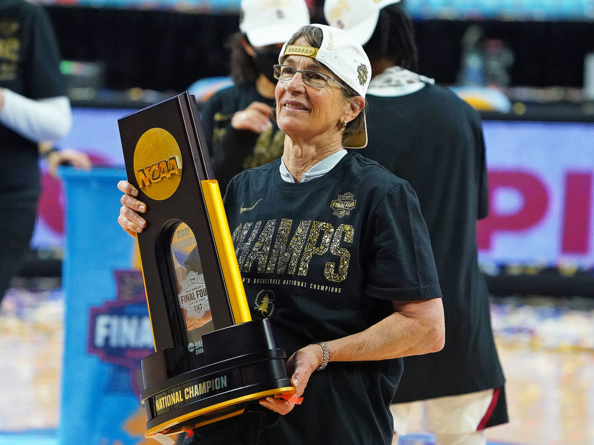 Stanford coach Tara VanDerveer poses with the trophy