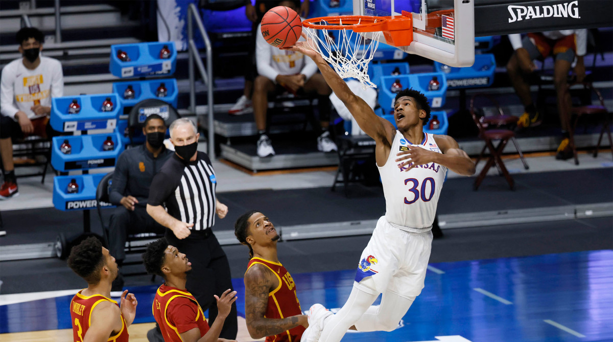 Kansas Jayhawks guard Ochai Agbaji (30) misses on an alleyoop dunk attempt the second round of the 2021 NCAA Tournament on Monday, March 22, 2021, at Hinkle Fieldhouse in Indianapolis, Ind.