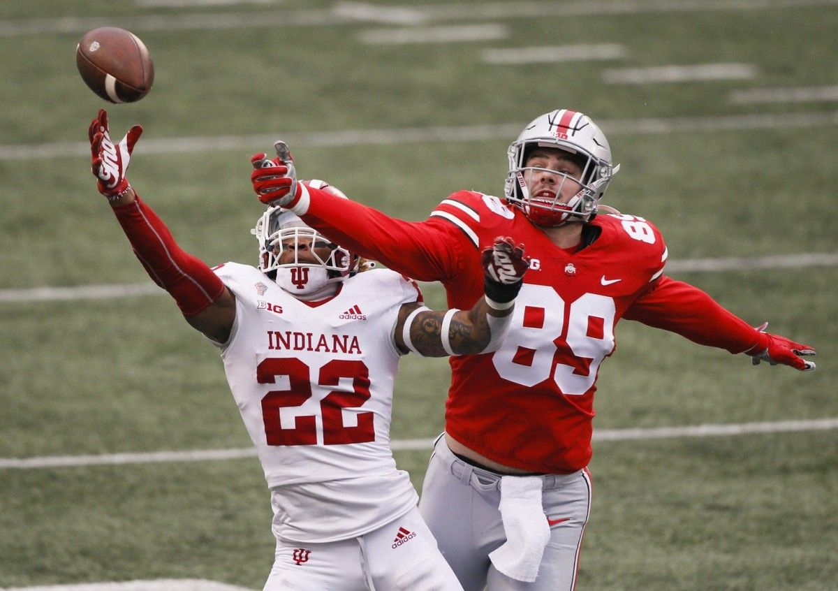 Ohio State Buckeyes tight end Luke Farrell (89) misses a pass under pressure from Indiana Hoosiers defensive back Jamar Johnson (22) during the first quarter of a NCAA Division I football game between the Ohio State Buckeyes and the Indiana Hoosiers on Saturday, Nov. 21, 2020 at Ohio Stadium in Columbus, Ohio. Cfb Indiana Hoosiers At Ohio State