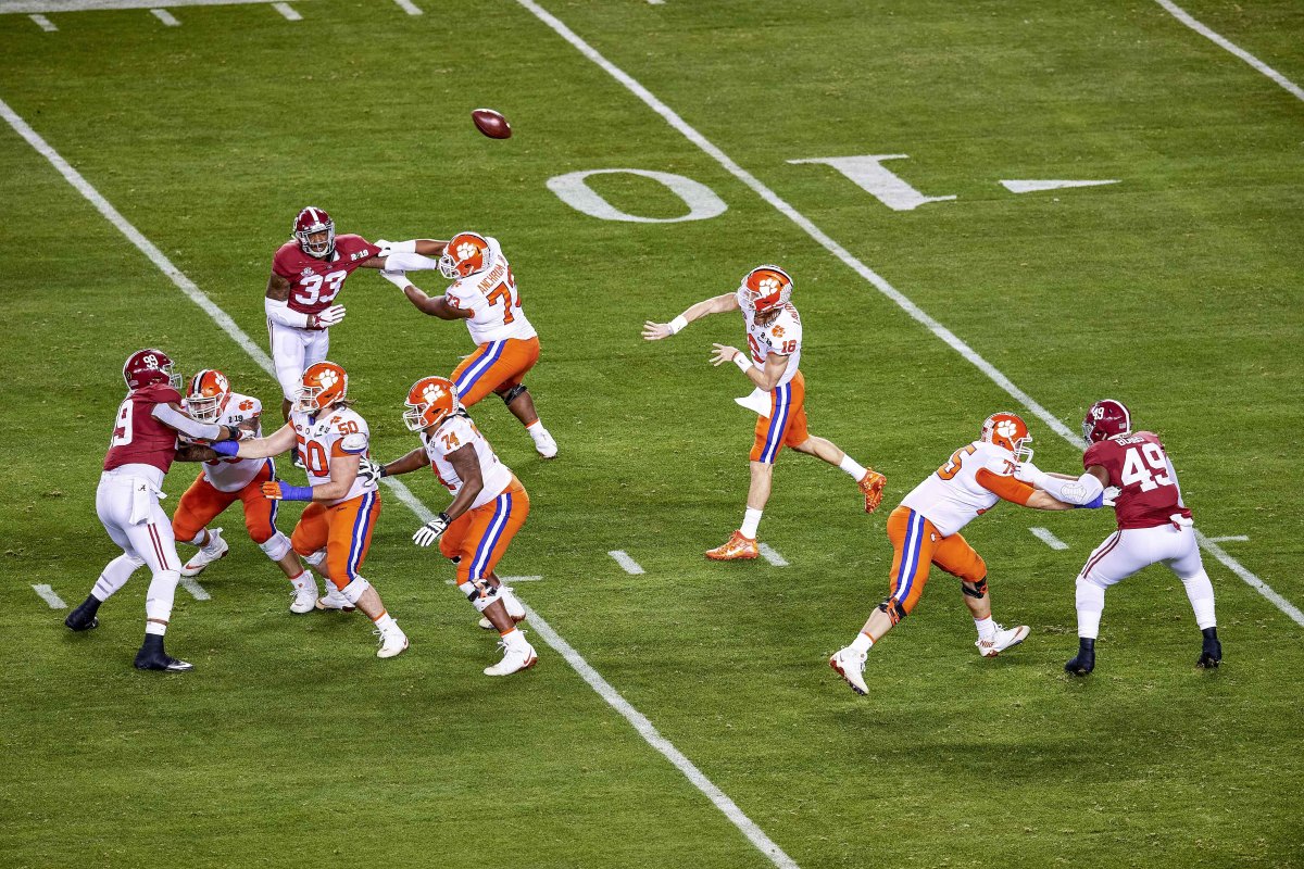 Trevor Lawrence throws a pass against Alabama in the national title game his freshman year at Clemson