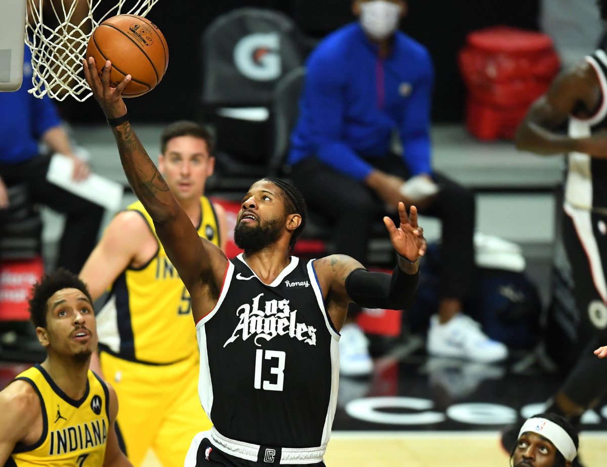 Jan 17, 2021; Los Angeles, California, USA; Los Angeles Clippers guard Paul George (13) goes up for a basket in the first half of the game against the Indiana Pacers at Staples Center. Mandatory Credit: Jayne Kamin-Oncea-USA TODAY Sports