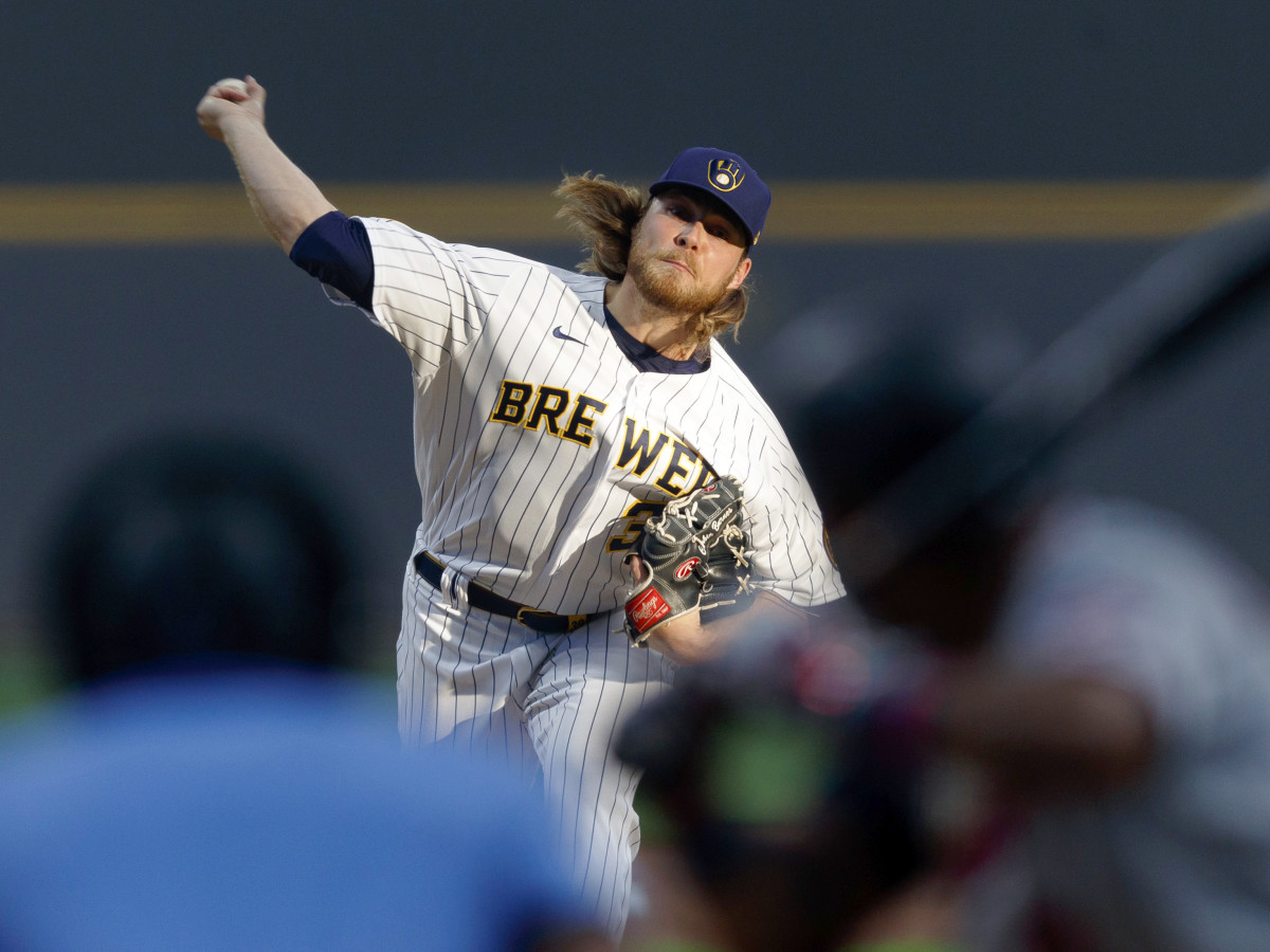 Apr 3, 2021; Milwaukee, Wisconsin, USA;  Milwaukee Brewers pitcher Corbin Burnes (39) throws a pitch against the Minnesota Twins during the first inning at American Family Field.