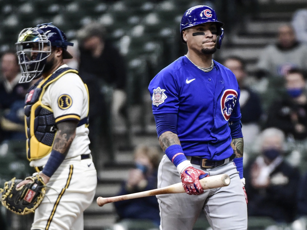 Apr 14, 2021; Milwaukee, Wisconsin, USA; Chicago Cubs shortstop Javier Baez (9) walks back to the dugout after striking out in the fourth inning during the game against the Milwaukee Brewers at American Family Field.
