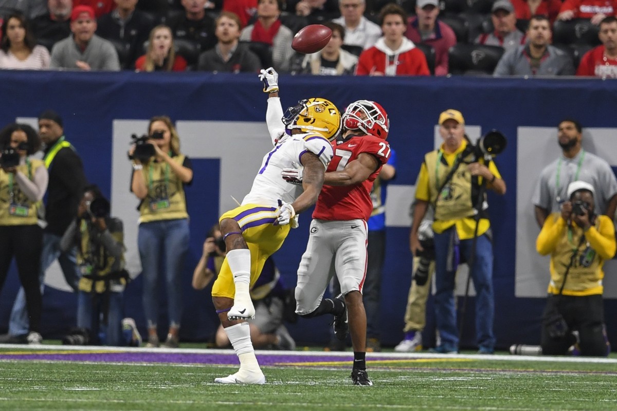 Georgia Bulldogs defensive back Eric Stokes (27) and LSU receiver Ja'Marr Chase (1) fight for a pass during the first quarter in the 2019 SEC Championship. Mandatory Credit: Dale Zanine-USA TODAY 