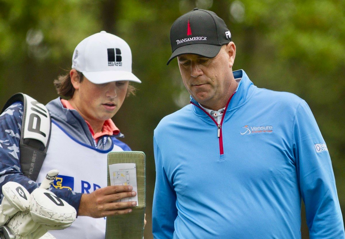 Stewart Cink and his son/caddie Reagan