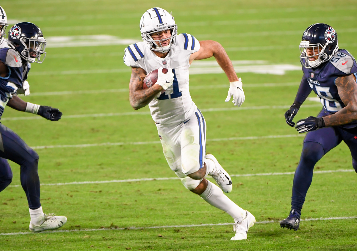 Nov 12, 2020; Nashville, Tennessee, USA; Indianapolis Colts wide receiver Michael Pittman (11) runs the ball against the Tennessee Titans during the second half at Nissan Stadium.