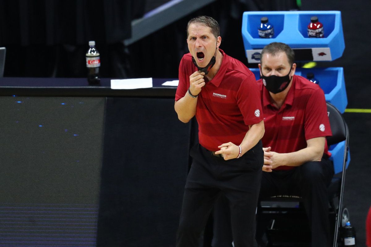 Arkansas Razorbacks head coach Eric Musselman yells from the sidelines against the Baylor Bears during the first half in the Elite Eight of the 2021 NCAA Tournament at Lucas Oil Stadium.