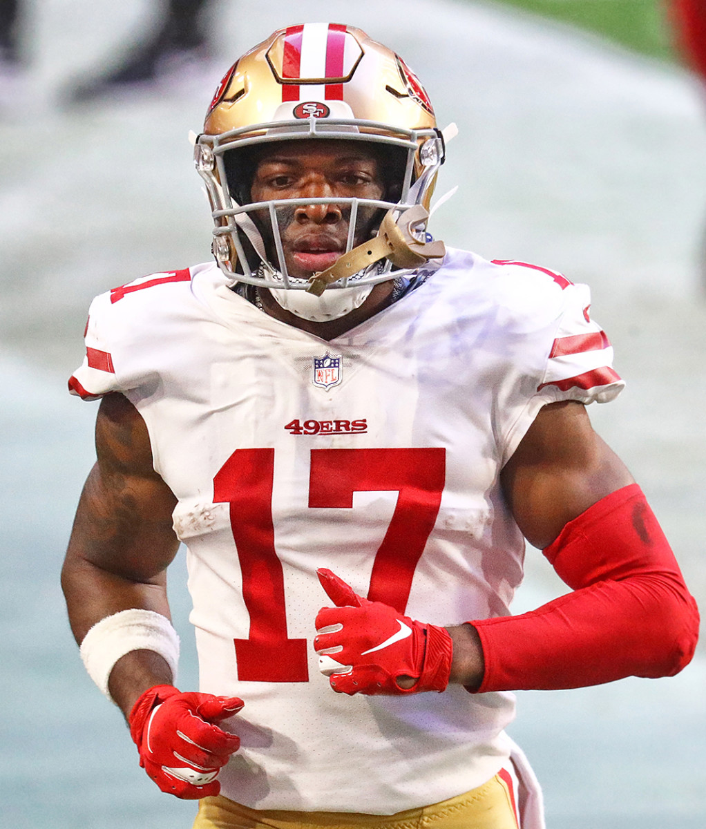 49ers receiver Matt Cole warms up on the sideline during a 2020 game