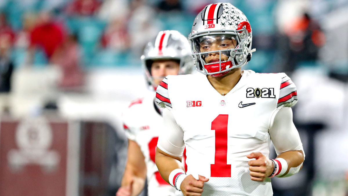 Justin Fields jogs off the field at the 2021 college football championship