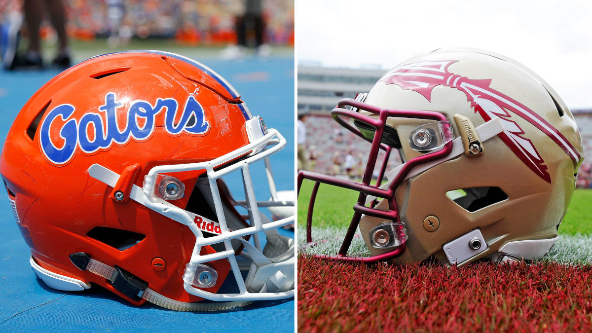 Florida and FSU football helmets sit on the ground
