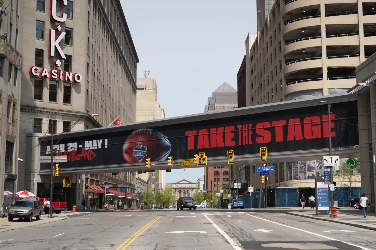 Apr 28, 2021; Cleveland, Ohio, United States; A pedestrian bridge with the words \"Take the Stage\" prior to the 2021 NFL Draft at the intersection of Prospect Ave and Ontario St. in downtown. Mandatory Credit: Kirby Lee-USA TODAY Sports
