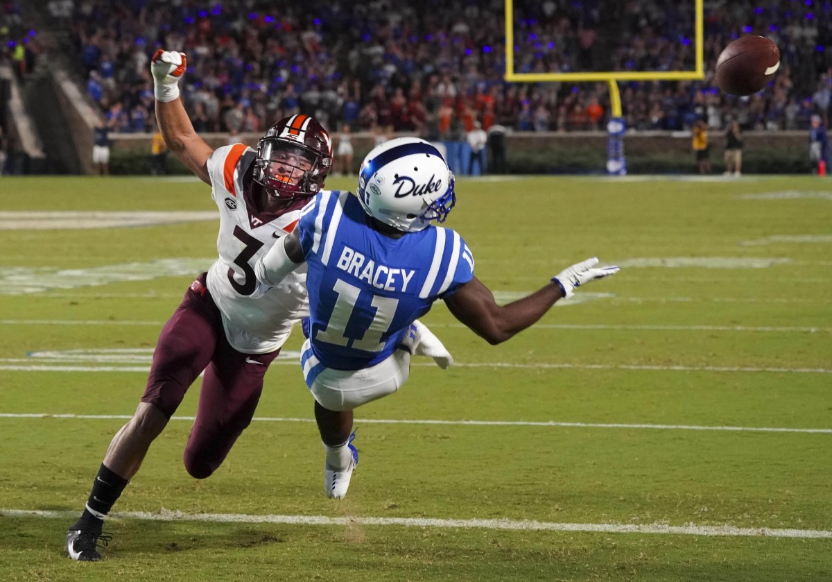Virginia Tech Hokies defensive back Caleb Farley (3) breaks up the pass attempt away from Duke receiver Scott Bracey (11). Mandatory Credit: James Guillory-USA TODAY 