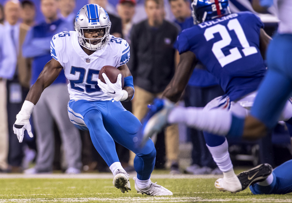 Lions running back Theo Riddick runs against the Giants