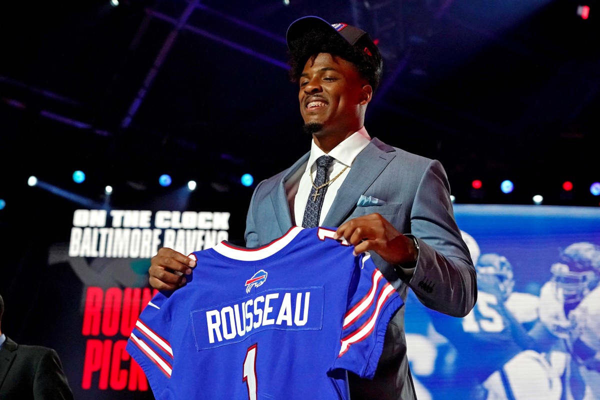 Gregory Rousseau (Miami) poses with a jersey after being selected by the Buffalo Bills as the number 30 overall pick in the first round of the 2021 NFL Draft at First Energy Stadium.