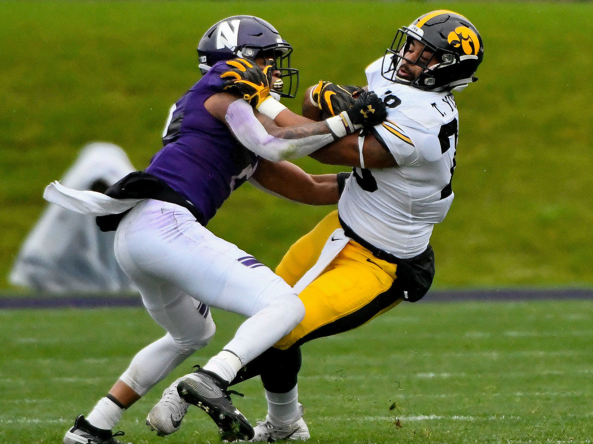 Northwestern's Greg Newsome II defends vs. Iowa