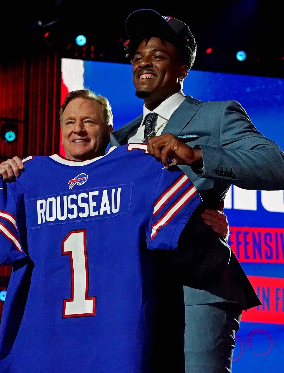 Gregory Rousseau (Miami) with NFL commissioner Roger Goodell after being selected by the Buffalo Bills as the number 30 overall pick in the first round of the 2021 NFL Draft at First Energy Stadium.