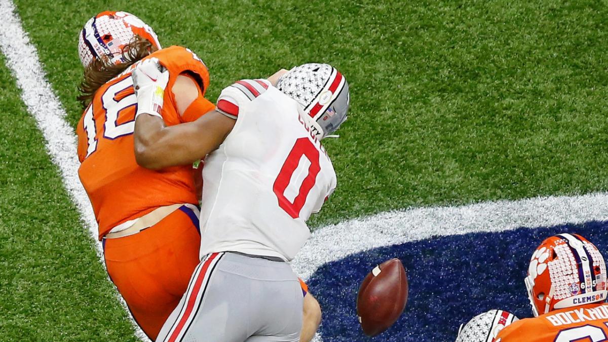 Ohio State Buckeyes defensive end Jonathon Cooper (0)) tackles Clemson Tigers quarterback Trevor Lawrence (16) during the fourth quarter at Mercedes-Benz Superdome.