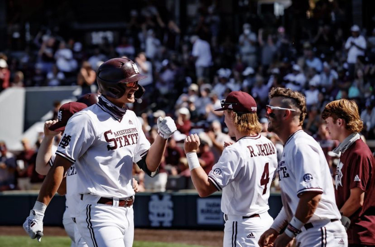 Mississippi State left fielder Brad Cumbest, left, celebrates with teammates Rowdey Jordan, center, and Tanner Allen on Saturday. (Photo courtesy of Mississippi State athletics)