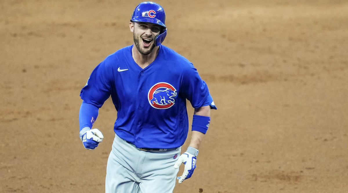 April 26, 2021; Cumberland, Georgia, USA; Chicago Cubs third baseman Kris Bryant (17) reacts after hitting a grand slam home run against the Atlanta Braves during the third inning at Truist Park.