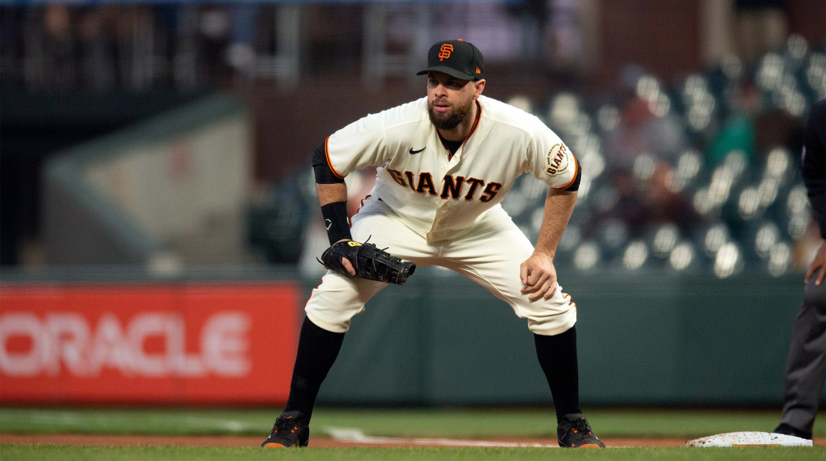 Apr 27, 2021; San Francisco, California, USA; San Francisco Giants first baseman Brandon Belt awaits the next pitch against the Colorado Rockies during the fifth inning at Oracle Park.