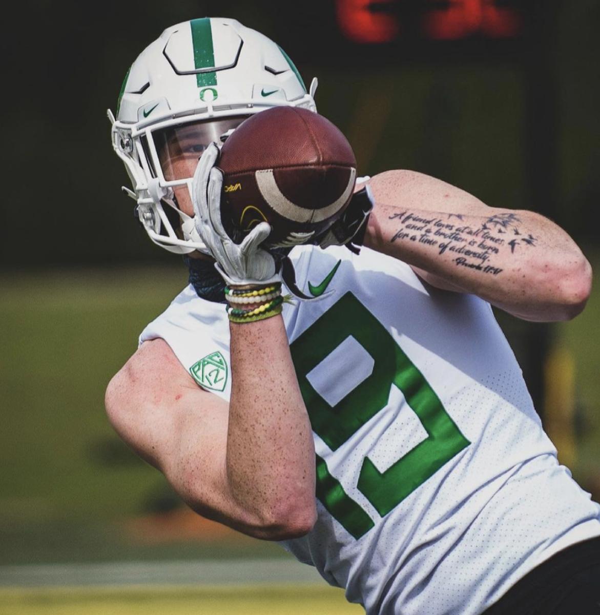 Early enrollee tight end Terrance Ferguson catches a pass in Oregon spring football practice.