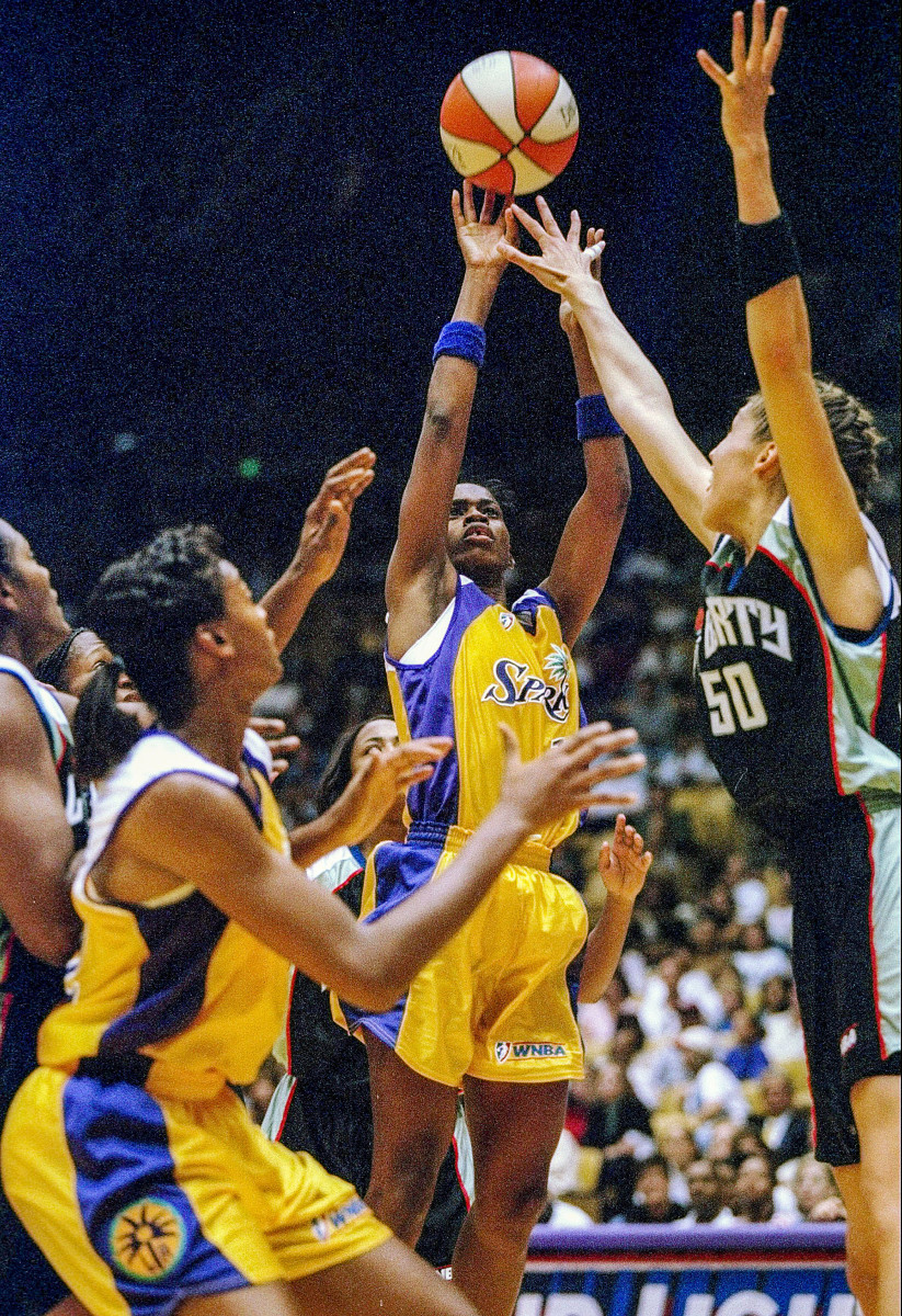 Penny Toler shoots the first bucket of the first WNBA game